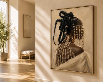 May include: A framed wall art print depicting a profile view of a person with dark skin, wearing elaborate braided hair adorned with gold accents, a multi-layered gold neck collar, and a decorative headpiece featuring hanging gold-toned beads.