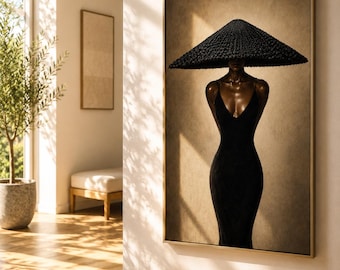 May include: A framed wall art print featuring a figure wearing a wide-brimmed, textured black conical hat and a form-fitting black dress with thin straps. The artwork is set against a neutral, light brown background with soft, warm lighting.