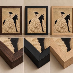 May include: A framed wall art print featuring a figure in a voluminous cream-colored ruffled gown and a wide-brimmed black hat riding a black horse. The artwork is available in three distinct frame finishes: dark wood, matte black, and light oak.