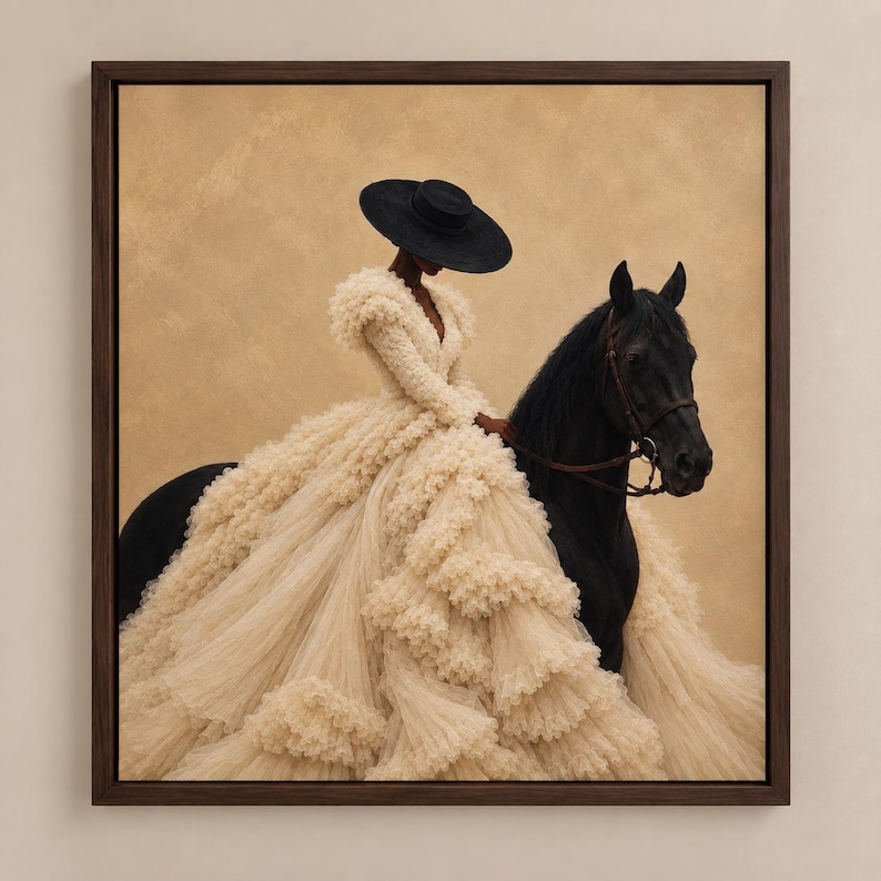 May include: A framed wall art print depicting a person wearing a voluminous, tiered cream-colored tulle gown and a wide-brimmed black hat, mounted on a black horse with a brown leather bridle against a solid, light tan textured background.