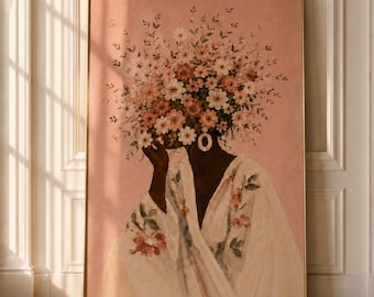 May include: A framed wall art print featuring a painting of a person with a large bouquet of pink and white flowers obscuring their head. The person wears a white robe with floral patterns and a single large white hoop earring against a pink background.