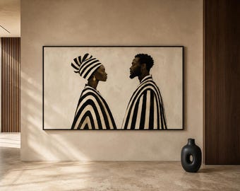 Könnte beinhalten: Ein gerahmter Wandkunstdruck, der das Seitenprofil zweier sich gegenüberstehender Personen zeigt. Beide tragen Kleidungsstücke mit markanten schwarzen und weißen vertikalen Streifen. Die linke Person trägt ein passendes Kopftuch und einen kleinen goldenen Ohrring.