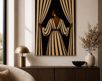 May include: A rectangular wall art print featuring a person with dark skin seen from behind, wearing a long-sleeved dress with vertical black and cream stripes. The person stands between two large, matching striped curtains against a black background.