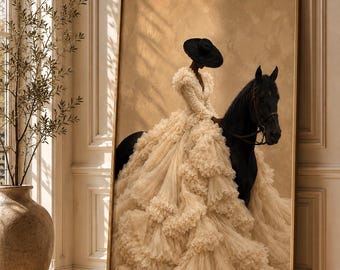 May include: A framed wall art print depicting a figure wearing a wide-brimmed black hat and a voluminous, floor-length cream-colored gown with layered ruffles, mounted on a black horse against a textured, light tan background.