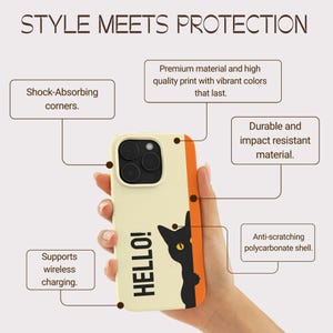 May include: A phone case with a cream-colored base and an orange stripe. The case features a black cat graphic and the word "HELLO!". The case is designed with shock-absorbing corners and supports wireless charging. The text "STYLE MEETS PROTECTION" is at the top.