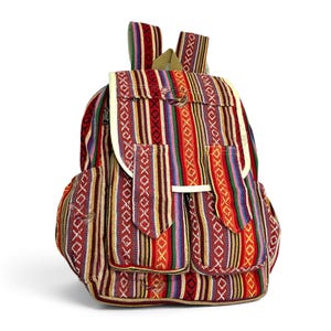 May include: A backpack featuring a vibrant, multi-colored striped pattern in shades of red, yellow, green, and purple. The bag includes a top flap with a cream-colored trim, two front pockets with matching flaps, and adjustable shoulder straps.