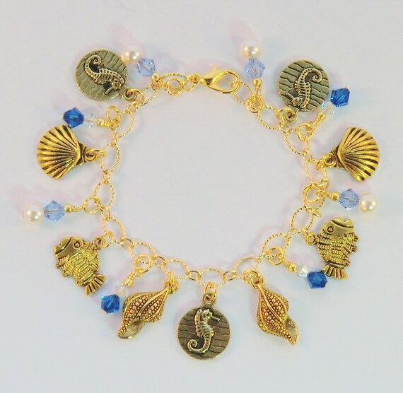 SALE Fish charm bracelet capri blue seahorse beach shell | Etsy