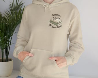 Currently Between Books Hoodie | Stacked Books with Glasses | Bookish Apparel