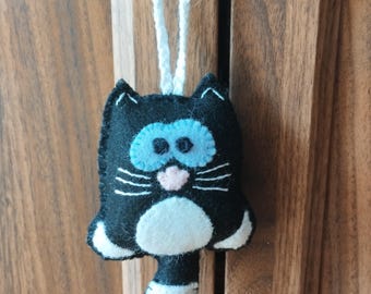 Handmade 100% natural wool felt hanging decoration. Cute cat!