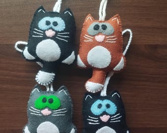 Handmade 100% natural wool felt hanging decoration. Cute cat!
