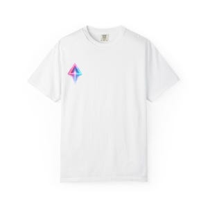 May include: White t-shirt with a crew neck and short sleeves. A neon pink and blue diamond-shaped graphic is printed on the left chest area. The shirt is made of a soft, comfortable material.