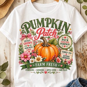 Pode incluir: Uma t-shirt branca com um gráfico colorido de uma abóbora laranja rodeada por flores cor-de-rosa e brancas, folhas verdes e bagas vermelhas. O texto diz PUMPKIN PATCH, LOCALLY GROWN MADE WITH LOVE, PICK YOUR OWN PUMPKIN, FAMILY FUN & AUTUMN MEMORIES, FARM FRESH, PUMPKINS, HAYRIDES, APPLE CIDER, CORN MAZE.