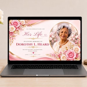 May include: A laptop screen displaying a memorial programme titled A Celebration of Her Life in Loving Memory of Dorothy L. Heard. The design features pink and white roses, gold accents, and a circular portrait of an older person with grey hair.