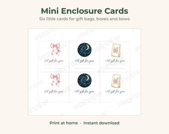 May include: Six mini enclosure cards arranged in two rows, featuring the text A gift for you. Designs include a pink bow, a dark blue starry night sky with a crescent moon, and a rectangular card with a pink floral illustration.