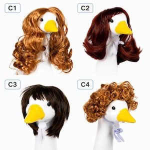 May include: Four white goose figurines wearing different synthetic hair wigs. C1 features long wavy ginger hair, C2 has shoulder-length dark auburn hair, C3 displays a dark brown bob with bangs, and C4 shows short, tight, curly light brown hair.