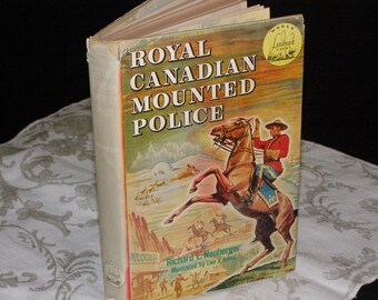 Royal Canadian Mounted Police by Richard L Neuberger  4th Edition 1953  Dust-jacket illistrated by Lee J Ames