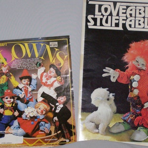 May include: A magazine cover featuring a colorful illustration of clowns with the title "Clowns" and the words "Fibre-Craft" and "$2.49".