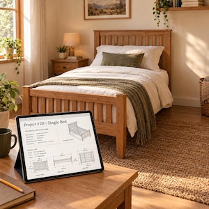 May include: A wooden single bed with a slatted headboard and footboard, dressed in white bedding and a green throw. A tablet in the foreground displays technical specifications, including dimensions of 39 inches wide and 77 inches long.