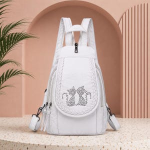 Mini mochila para mujer de piel vegana, ligera, tipo bandolera, informal, para viajes o para la escuela.