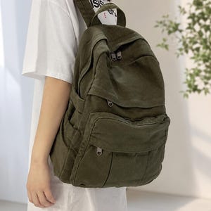 Canvas laptoprugzak voor school, reizen, woon-werkverkeer en dagelijks gebruik. Een functionele tas.