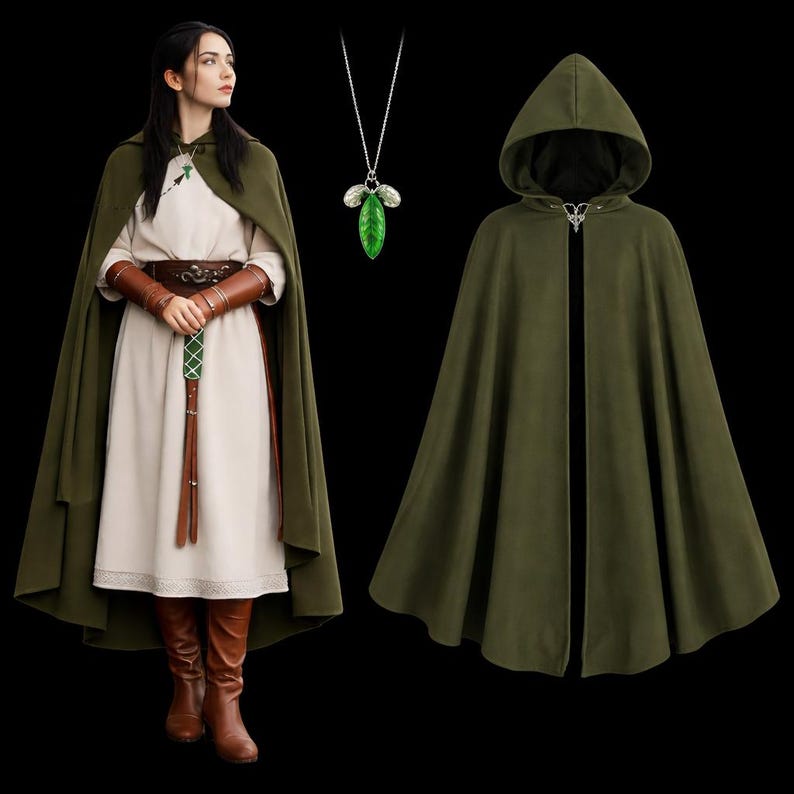 May include: An olive green hooded cloak with a clasp closure, displayed next to a person wearing a similar cloak and a white dress. The person is also wearing brown leather arm cuffs, a belt, and boots. A green leaf pendant hangs from a silver chain.