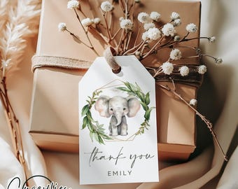 May include: A white thank you tag with a gold geometric frame and a watercolor illustration of a baby elephant surrounded by green leaves. The text "thank you" and the name "EMILY" are printed on the tag.