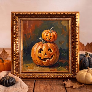 May include: An oil painting in a decorative gold frame depicting two carved orange jack-o'-lanterns stacked on top of each other. The pumpkins feature triangular eyes and wide, toothy grins, set against a dark, textured background of autumn colors.