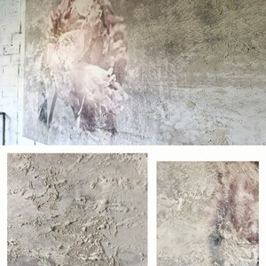 May include: Large, hand-textured canvas art piece with a floral design in muted tones. The artwork features a rough, layered texture, with the words "HAND TEXTURED OPTION" in red at the top. The overall color palette is neutral, with shades of gray and white.