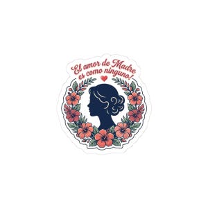 May include: A sticker with a woman's silhouette in a floral wreath. The wreath is adorned with red and pink flowers and green leaves. The text "El amor de Madre es como ninguno!" is written in red script.