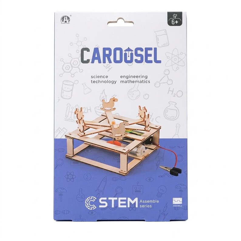 May include: A STEM Assemble Series kit featuring a wooden carousel model. The box displays the word "CAROUSEL" and mentions science, engineering, technology, and mathematics. The model includes wooden horse figures and a motor.