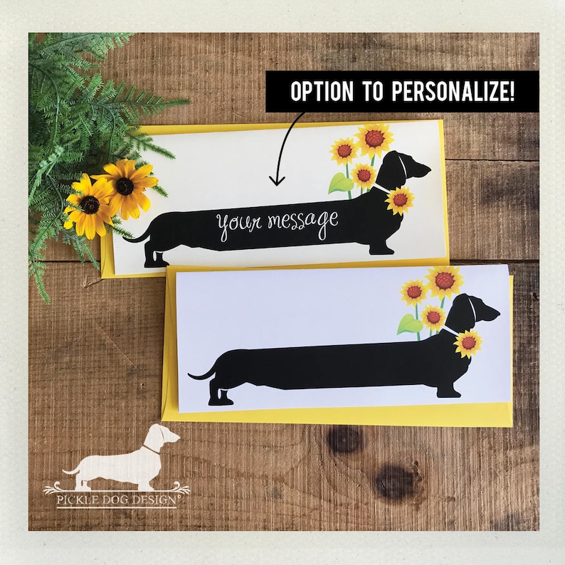 May include: Greeting cards featuring a black dachshund silhouette adorned with sunflowers. The cards have a yellow border and a white interior with the option to personalize the message. The text "OPTION TO PERSONALIZE!" is displayed.