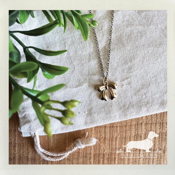 Bow. Necklace