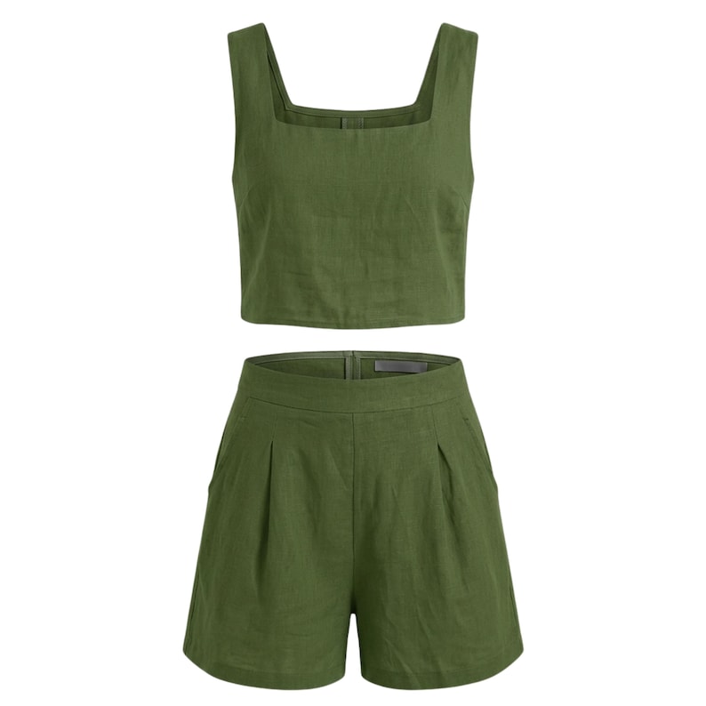 May include: Olive green two-piece outfit. The set includes a square-neck crop top and high-waisted shorts. The shorts have pleats and pockets. The fabric appears to be linen or a similar lightweight material. The outfit is designed for warm weather.