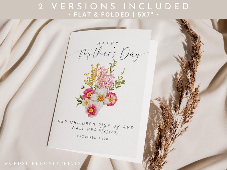 May include: A folded Mother's Day card with a floral bouquet design. The card features the text "Happy Mother's Day" and a quote from Proverbs 31:28. The card is 5x7 inches and includes two versions: flat and folded.