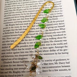 May include: A set of three ceramic nesting bowls in shades of blue, green, and white. The bowls feature a speckled glaze and a simple, modern design. The largest bowl measures approximately 6 inches in diameter.