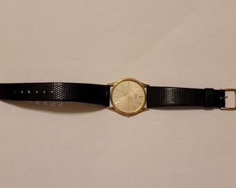 Reloj Seiko vintage de cuarzo tono dorado de 1983, modelo 7431-7009, raro.