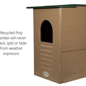 May include: A tan birdhouse with a dark green roof and a rounded entrance. The birdhouse is made of recycled poly lumber and features the text "Clean Out". The text "Recycled Poly Lumber will never crack, split or fade from weather exposure" is also visible.