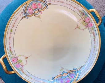 Prato para bolo antigo Haviland France Limoges com alças, rosas cor-de-rosa e arabescos azuis, 23 cm
