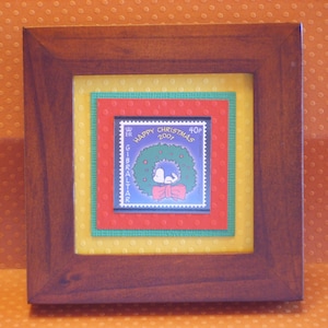 Erdnüsse gerahmt Weihnachtsstempel 2001 aus Gibraltar - Snoopy Nickerchen