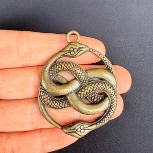 Antique Brass Double Snake Pendant | Ouroboros Charm | Celtic Knot Metal Amulet | Rebirth & Eternity Symbol