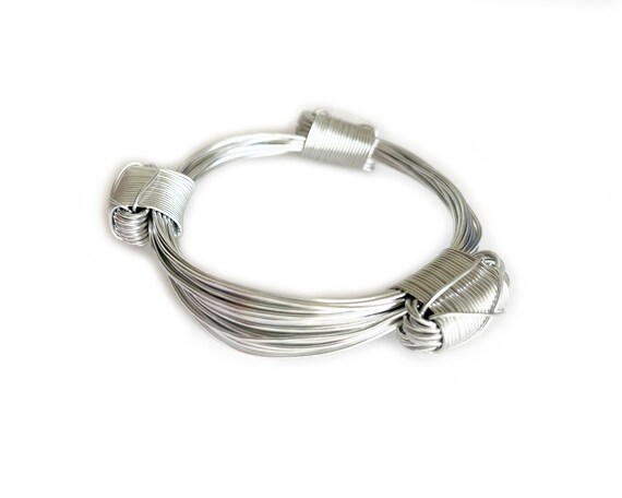 Metal knot bracelet clearance