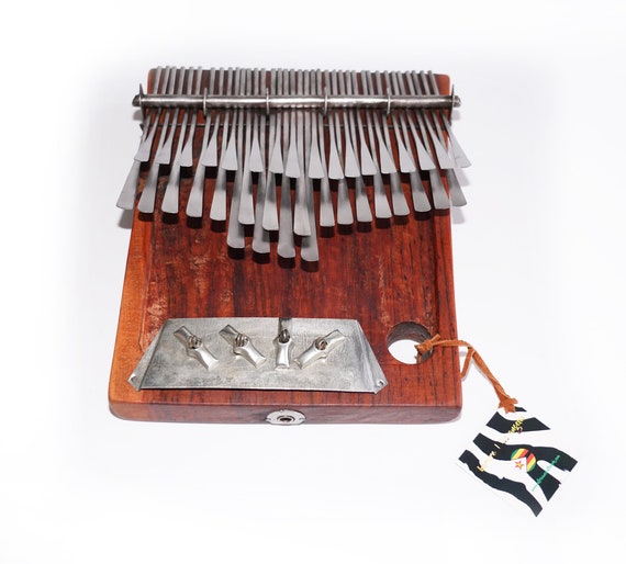 Electric mbira outlet