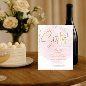 May include: A birthday party scene with a white cake, champagne glass, and a black wine bottle. A floral arrangement of white and cream roses is in the background. A pink and gold invitation card reads "Sixty!" with event details.
