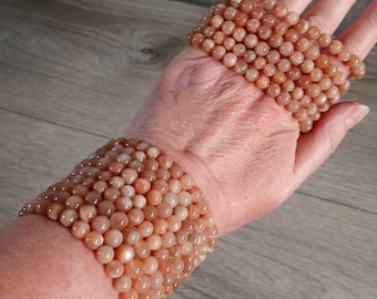Peach Moonstone Bracelet 6 mm Stretchy String Round Crystals 159