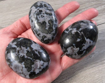 Mystic Merlinite Palm Stone 2 inch + Crystal