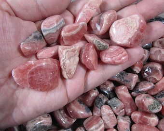 Rhodochrosite Tumbled Stone 0.75 inch + Crystal