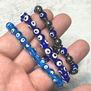 Pulsera de cuentas de vidrio de 8 mm con efecto de ojo malvado