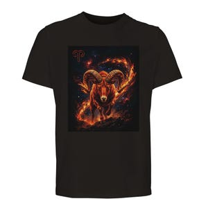 May include: Black t-shirt featuring a vibrant graphic of a ram with fiery details against a starry background. The Aries zodiac symbol is displayed in red. A bold design for astrology enthusiasts.