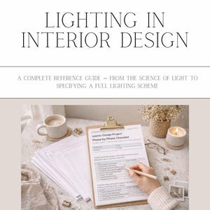 May include: A guide to interior design lighting, with the title and a checklist visible. The image includes a coffee cup, candle, and a hand holding a pencil, suggesting a study or work environment.