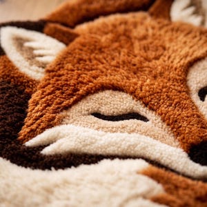 Close up hand tufted fox rug, ultra soft woodland animal carpet, fluffy orange fox area rug for nursery and kids room, cozy faux fur floor decor, cute handmade forest theme home accent